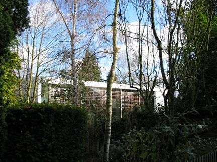 a modern house in the Radlett North Conservation Area - trees help to soften the appearance of buildings in Conservation Areas