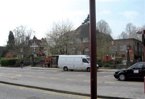 The Red House Surgery and Post Office in Watling Street, Radlett viewed from the east