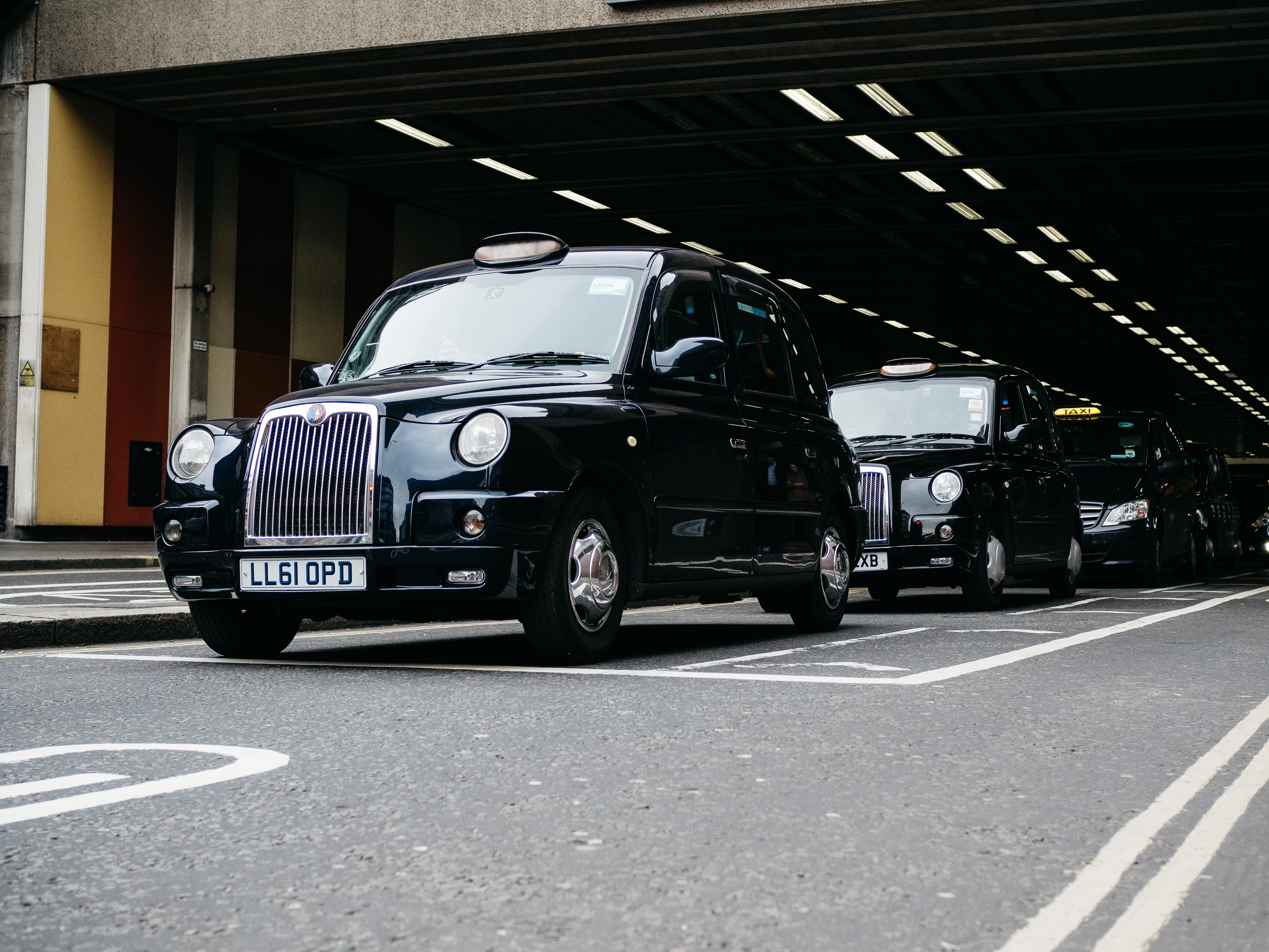 Black taxis in a row