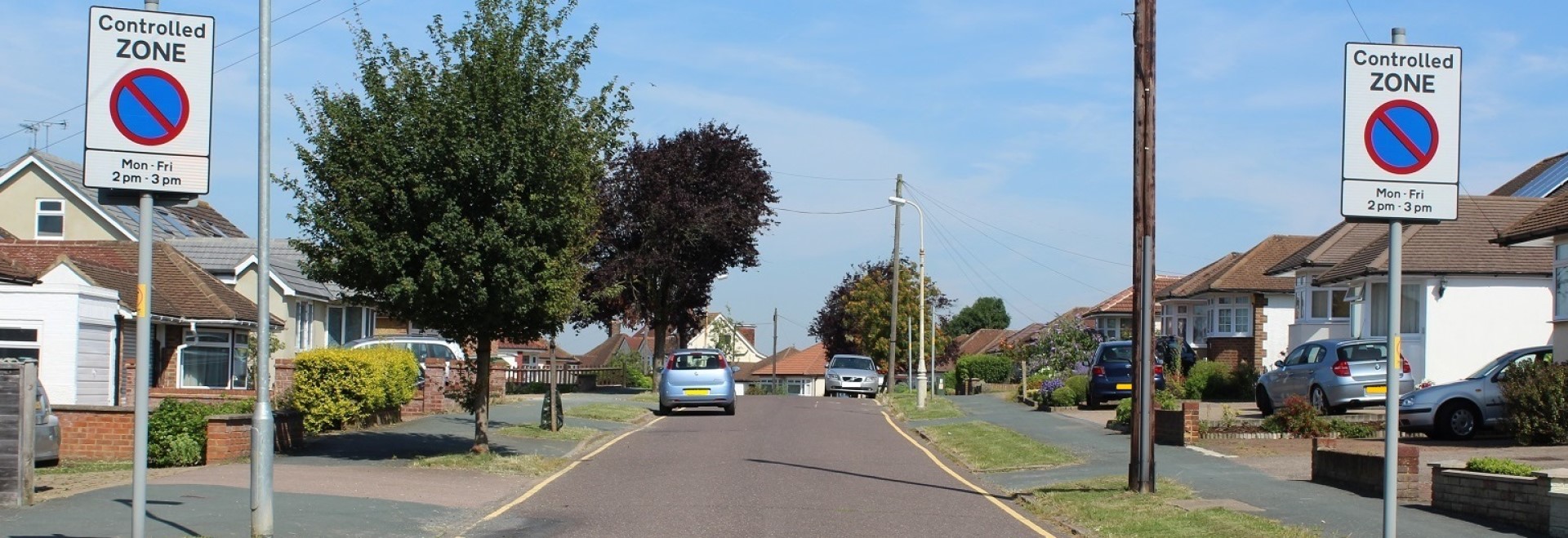 A street with Controlled Zone parking signage