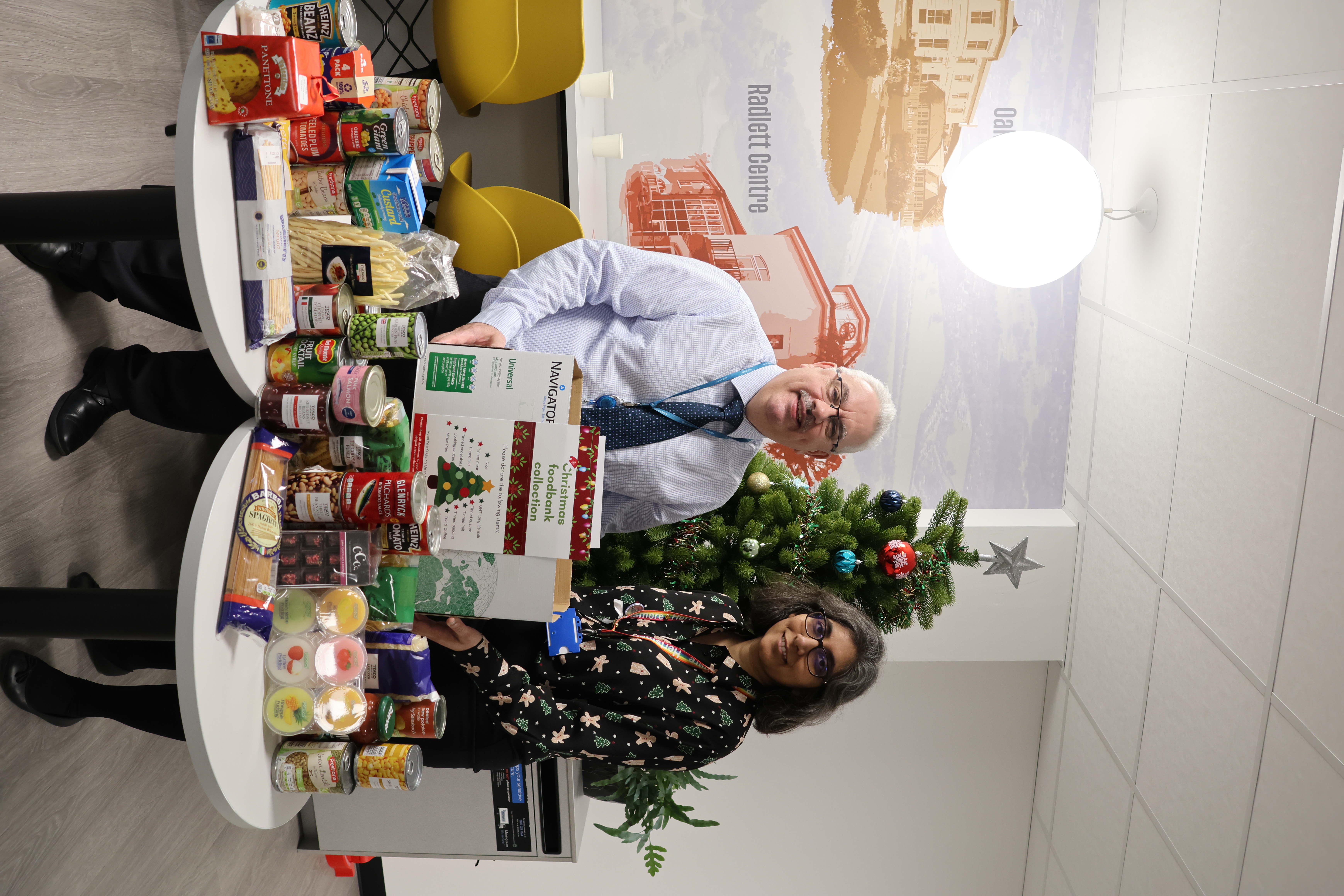 Officers with foodbank donations