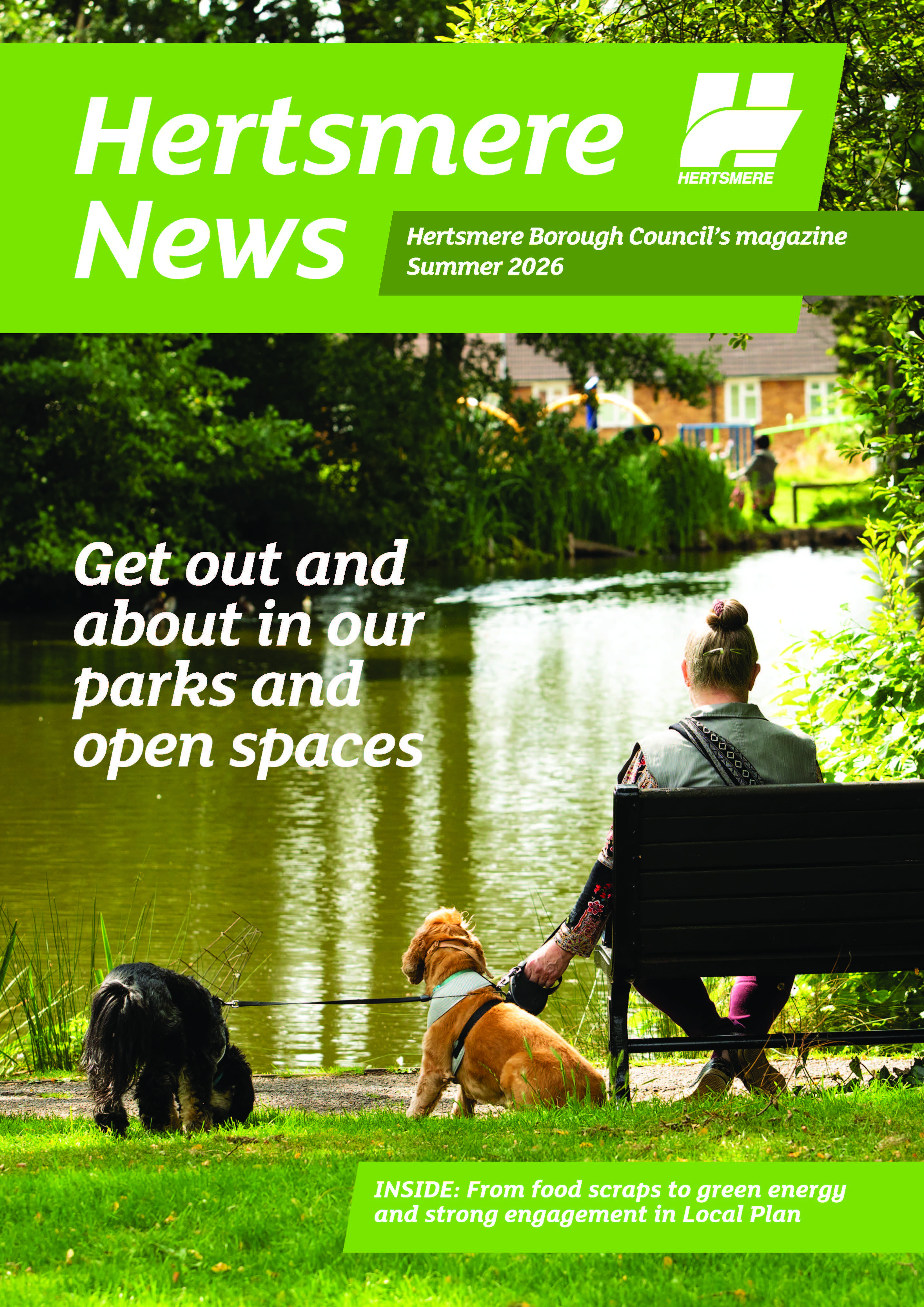 The front cover of Hertsmere News featuring a lady sitting on a park bench with her two dogs on a lead. 