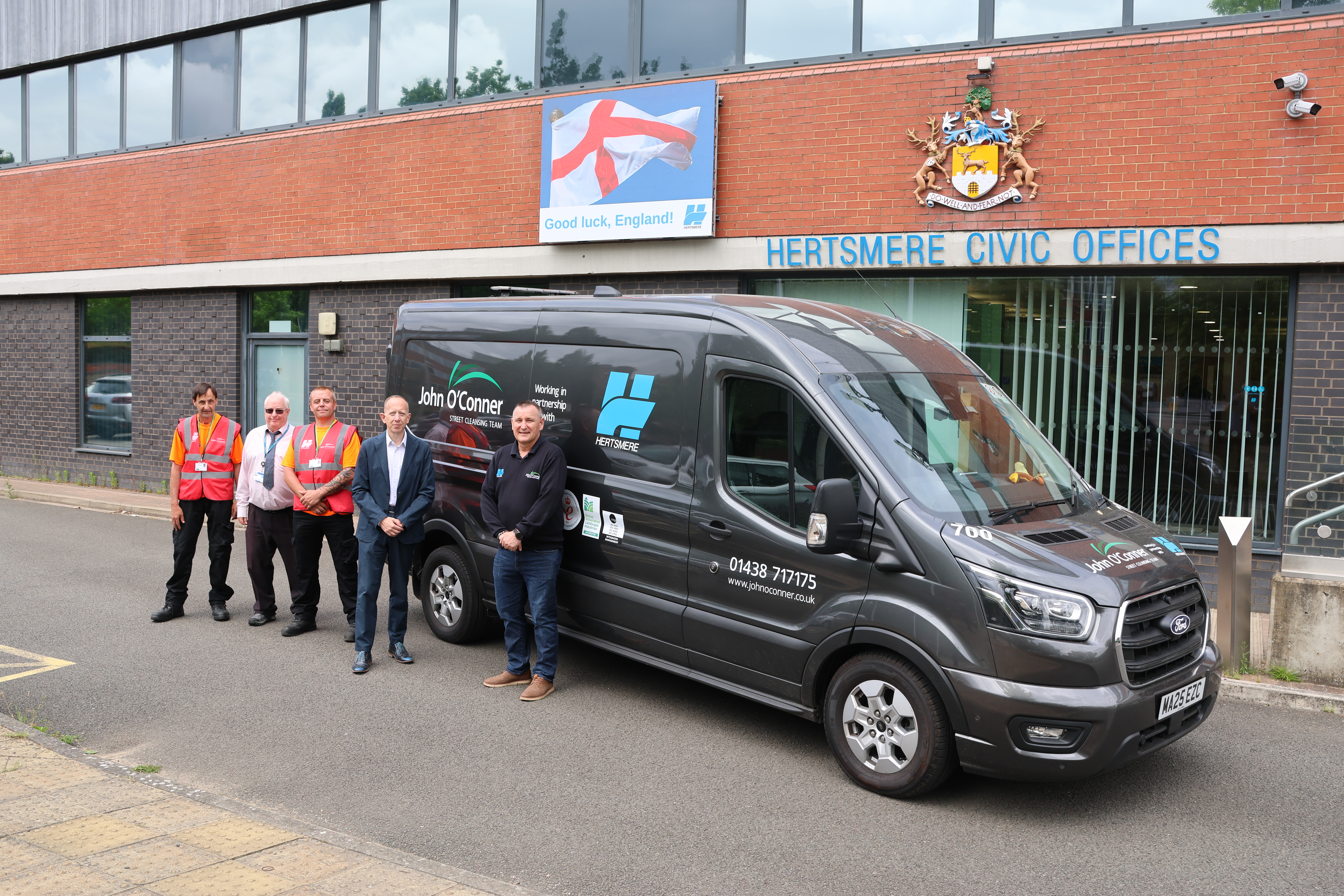 Street cleaning team and van