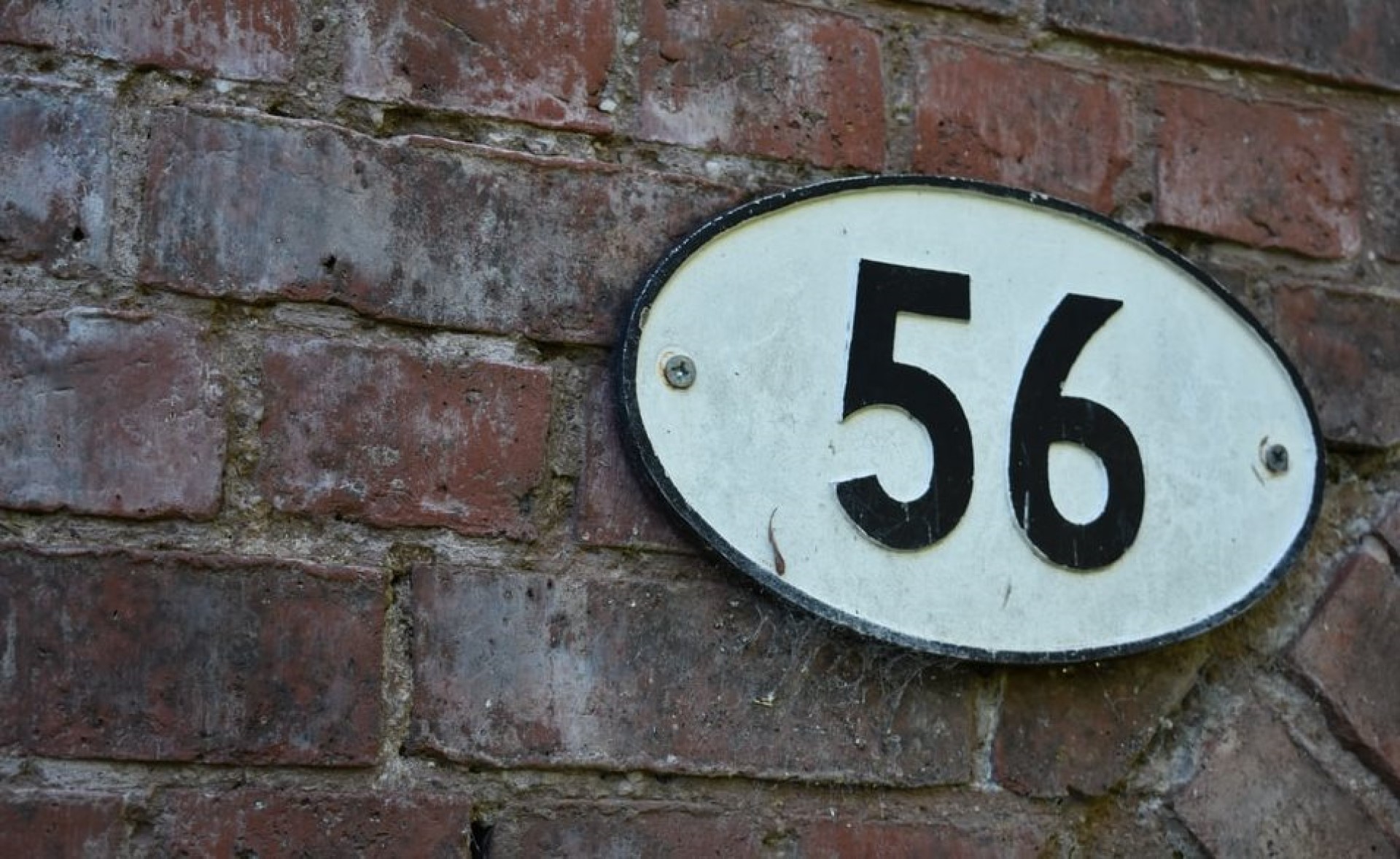 Number 56 plaque sign on a property