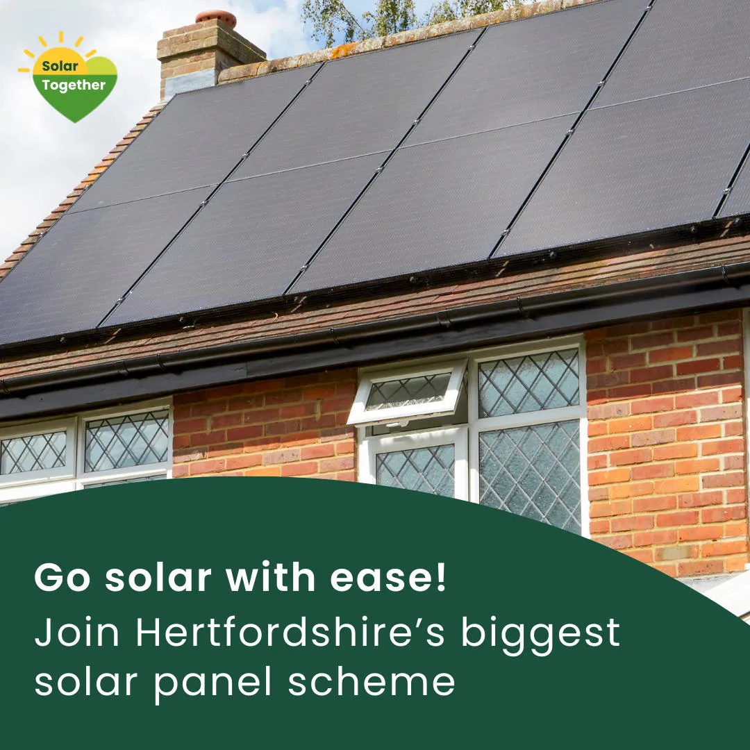 A house with solar panels on roof.