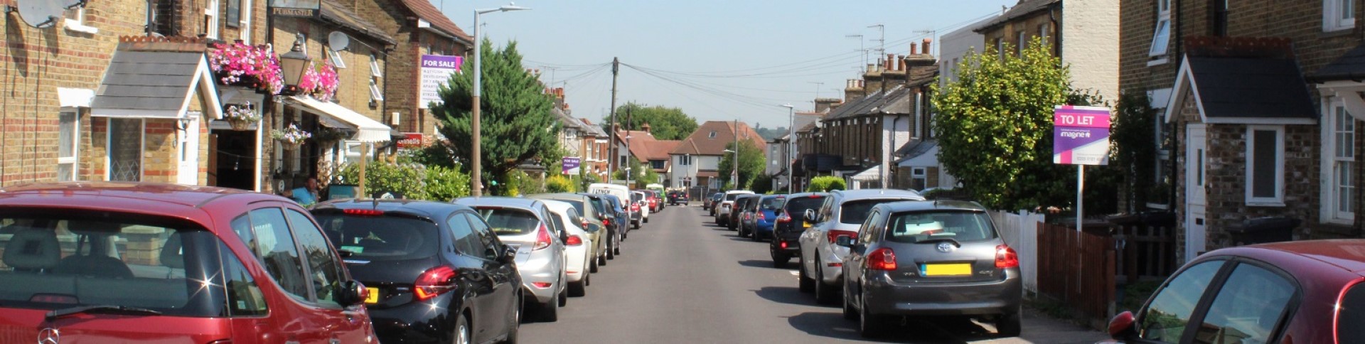 image of cars parked on street