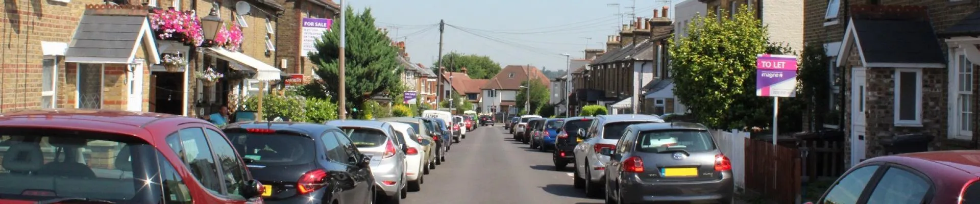 image of cars parked on street